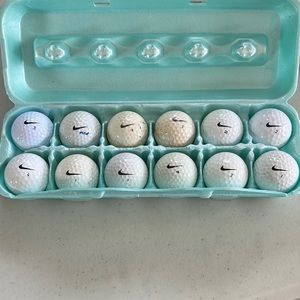 12 used Nike golf balls.